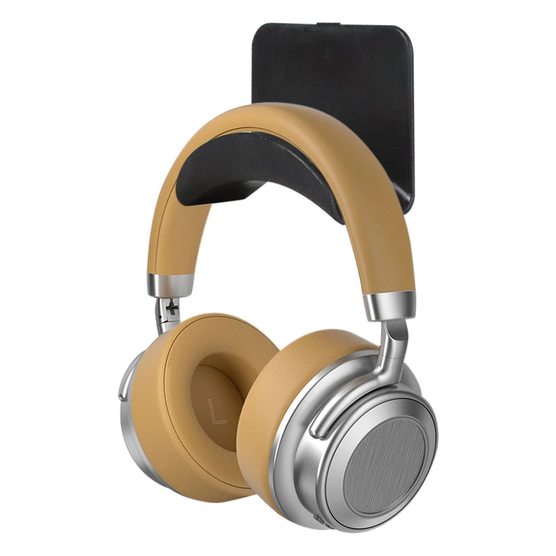 Wall mounted headphone stand with tan headphones